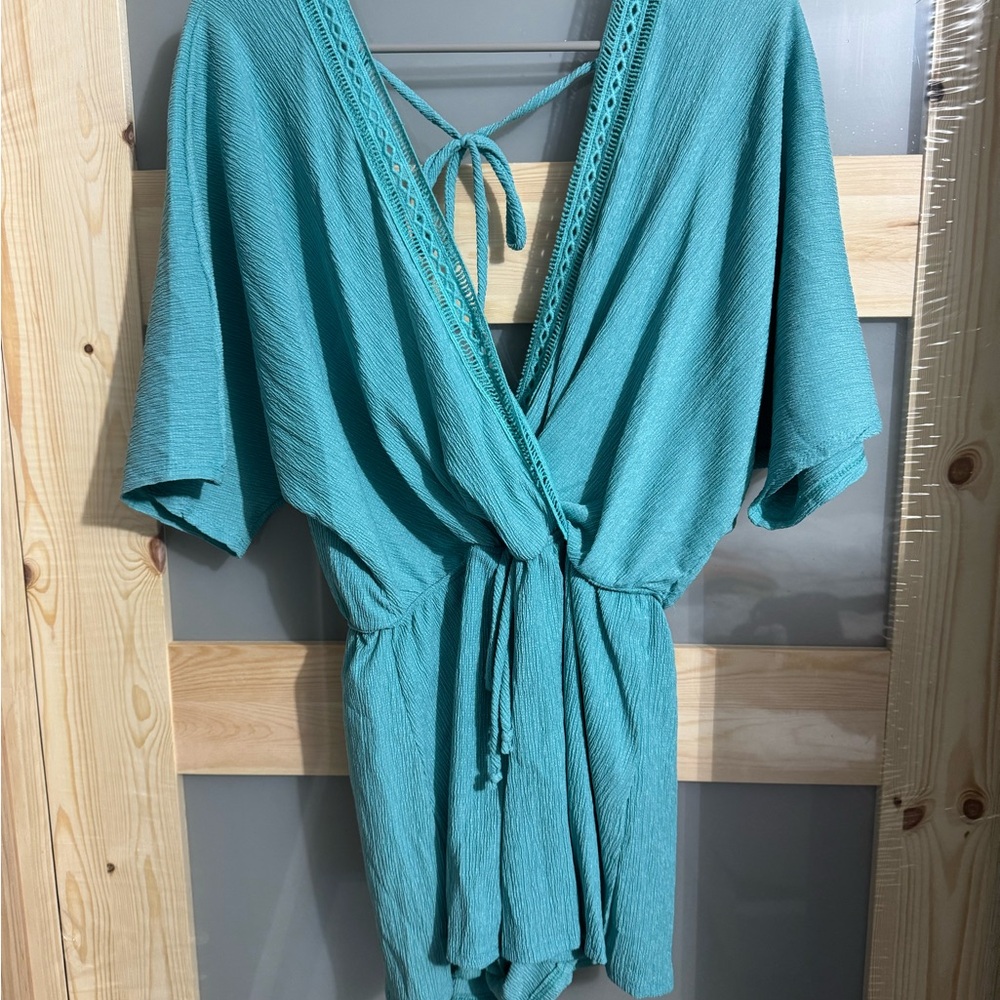 Blue Blush Turquoise Textured Romper
NWOT